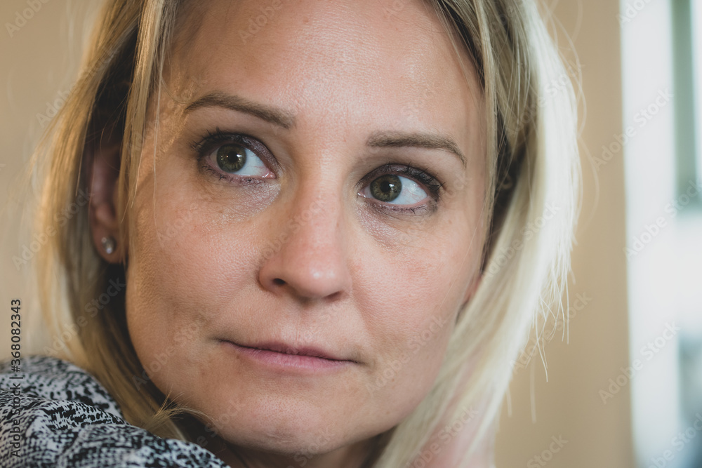 Caucasian woman at a spa with outdoor pool and garden - displaying ...