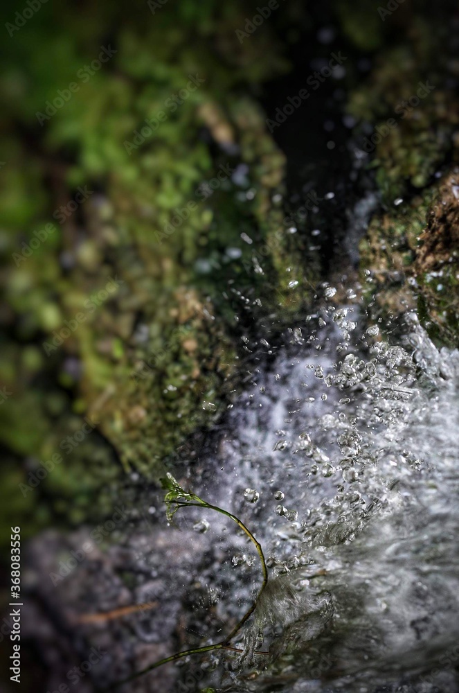 water flowing over rocks water flowing over rocks