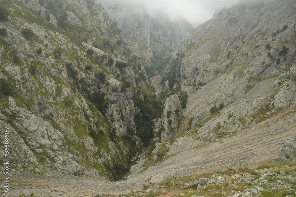 The dramatic landscape of the Picos de Europa mountains in Cantabria and Castile and León in Spain The dramatic landscape of the Picos de Europa mountains in Cantabria and Castile and León in Spain