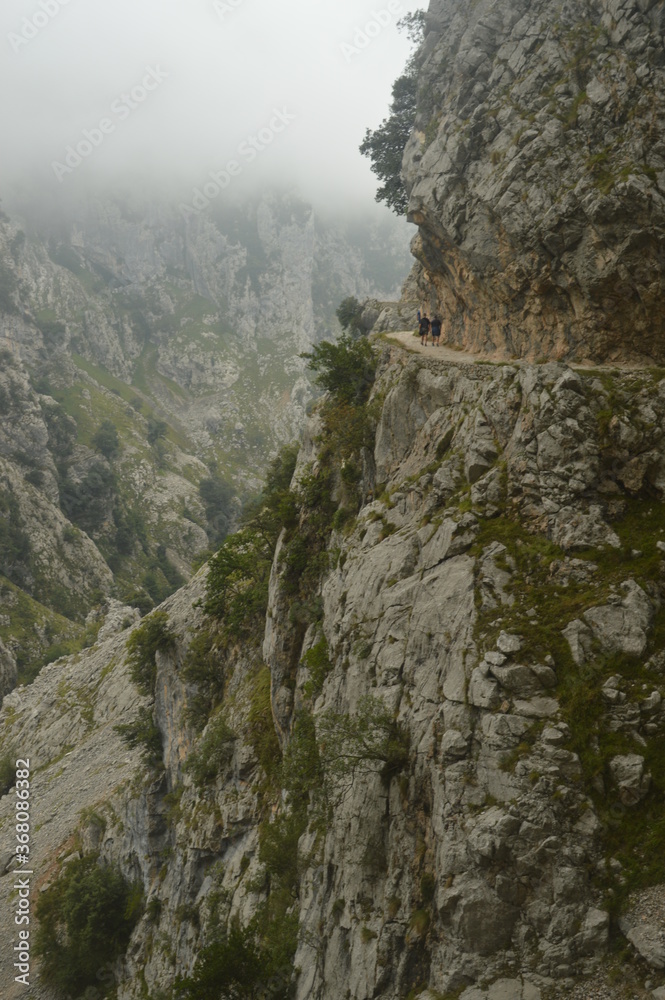 The dramatic landscape of the Picos de Europa mountains in Cantabria and Castile and León in Spain The dramatic landscape of the Picos de Europa mountains in Cantabria and Castile and León in Spain