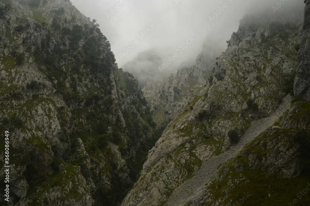 The dramatic landscape of the Picos de Europa mountains in Cantabria and Castile and León in Spain The dramatic landscape of the Picos de Europa mountains in Cantabria and Castile and León in Spain