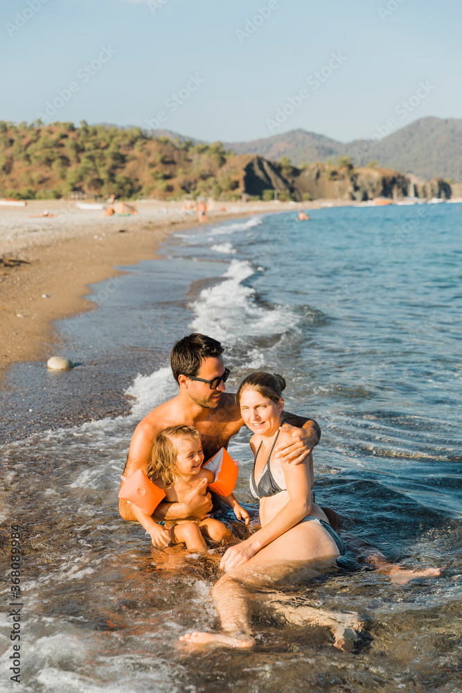 Family having fun in sea Family having fun in sea