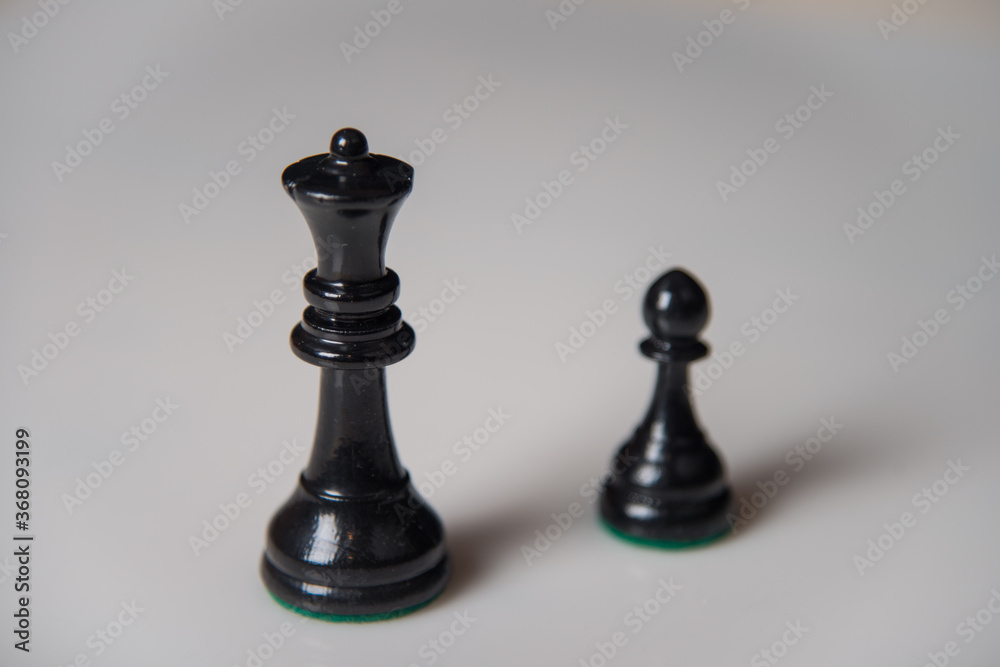 Chess pieces on a wooden board. The concept of tactical games. Chess pieces on a wooden board. The concept of tactical games.
