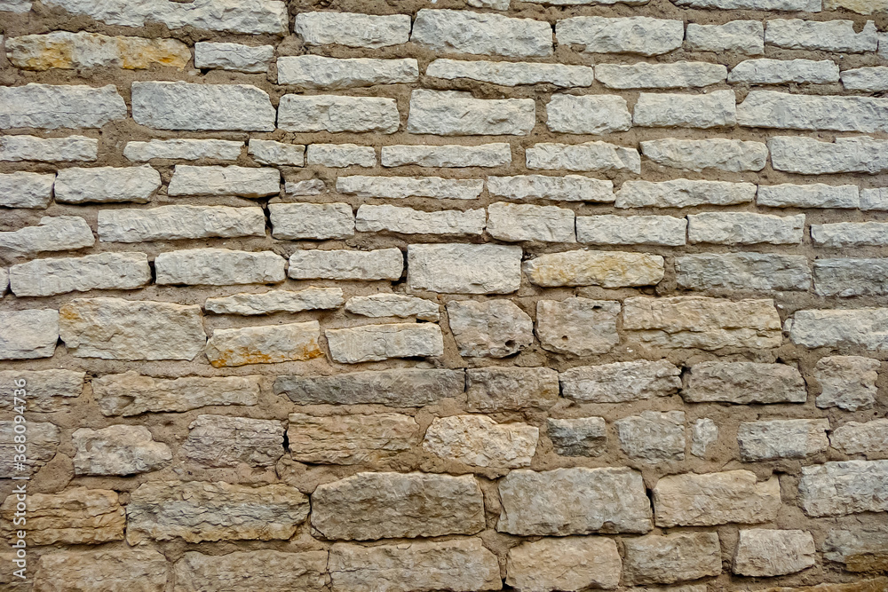 texture of old masonry made of natural raw stone texture of old masonry made of natural raw stone