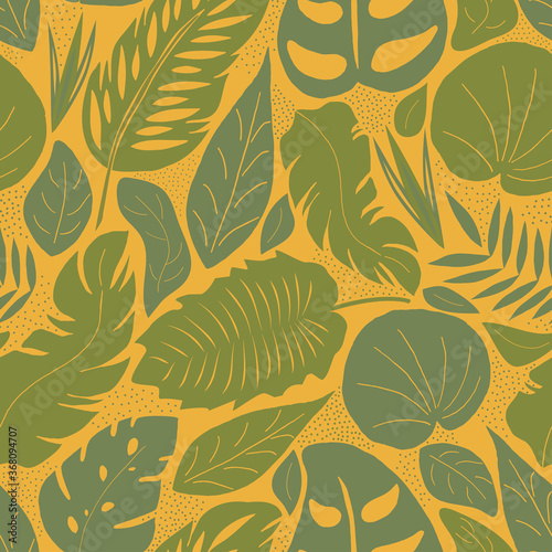 Seamless pattern with tropical leaves. Vector illustration-exotic plants on a yellow background . Fashionable Botanical fabric design. Illustration of the jungle.