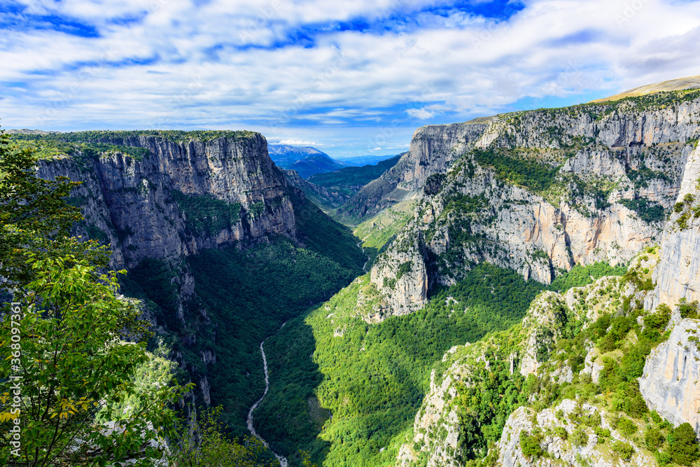 View of Vikos Gorge from Beloi Viewpoint. The Vikos Gorge is listed by the Guinness Book of Records as the deepest canyon in the world.
