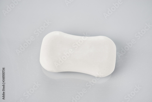 Bar of soap on gray background