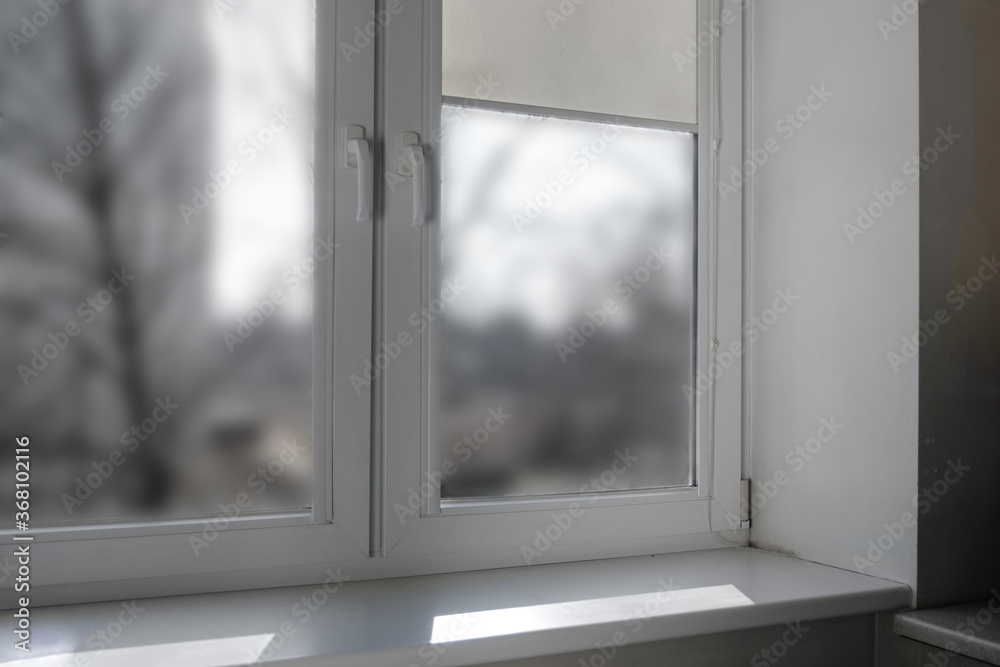 White room and window. Empty window with a sill and shutters. White room and window. Empty window with a sill and shutters.