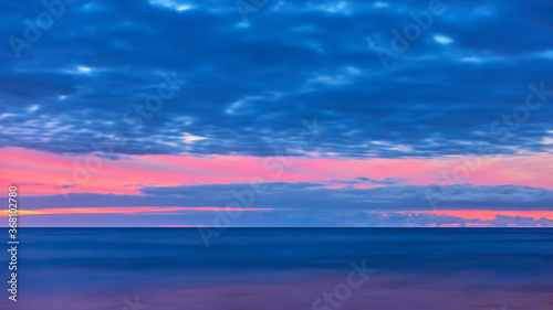 Atlantic ocean and sky with clouds after sunset