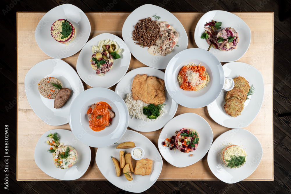 Assortment of russian meals on a table, directly above view