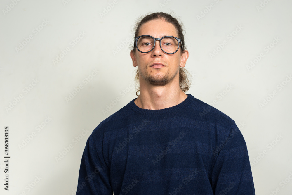 Portrait of handsome bearded man with long hair
