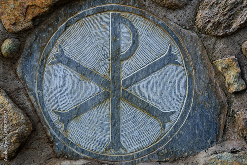 "Chi Rho" Symbol carved on stone in stone wall of The Great Meteoron Holy Monastery of the Transfiguration of the Savior. Chi Rho Symbol is an ancient Christian symbol meaning "Christ"