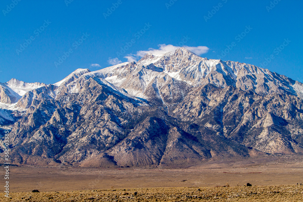 The Sierra Nevada mountains.  It is a mountain range in the Western United States, between the Central Valley of California and the Great Basin.