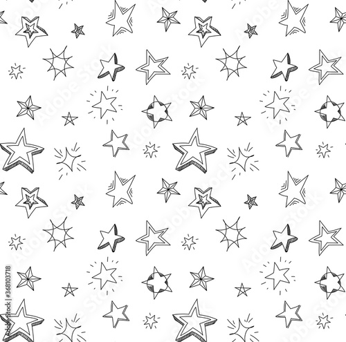 Hand drawn stars doodle seamless pattern. Background with stars for decoration isolated on white background.