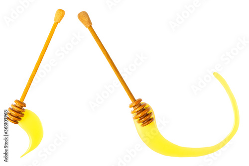 honey dipper with honey in circle form isolated on white background.