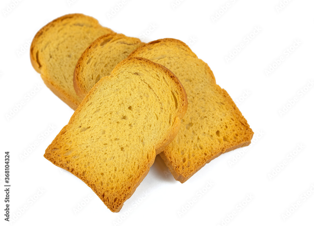 Zwieback in Scheiben vor weißem Hintergrund Zwieback in Scheiben vor weißem Hintergrund