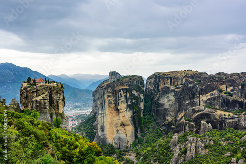 Panoramic view of the mountain formations of Meteora and Holy Trinity Monastery at Meteora