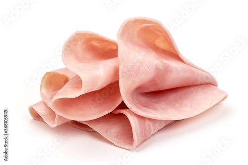 Cooked ham slices, isolated on a white background photo