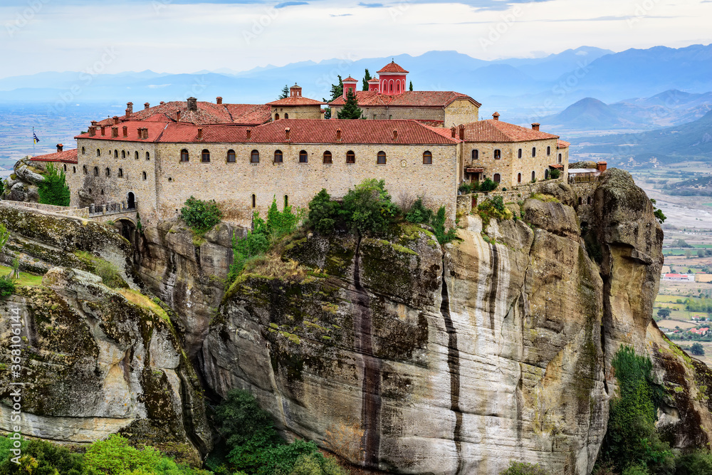 Panoramic view of the mountain formations of Meteora and Monastery of St. Stephen