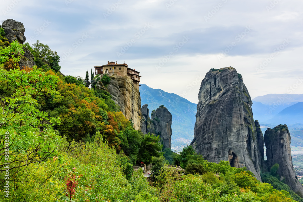 Panoramic view of the mountain formations of Meteora and Monastery of Rousanou