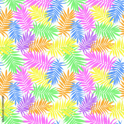 Colored palm leaves seamless pattern. Tropical background. Concept for textile, wall paper, fabric, invitation, wrapping paper, stationery design.