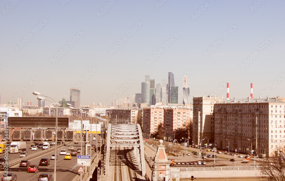 Fototapeta premium Apr 12, 2018. Moscow, Russia. Landscape with Moscow International Business Center and Moscow Central Circle Railway