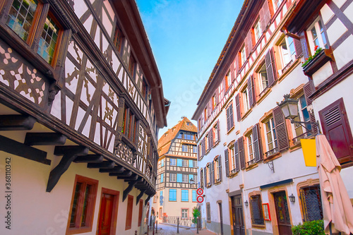 Urban view of traditional half-timbered houses on canals in district little France in the medieval town of Strasbourg, Alsace, France.