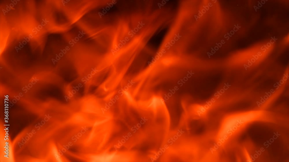Fire flames with flying sparks background. Firestorm texture, shot of flying fire sparks in the air. Sparks from bonfire over dark night backdrop. Slow motion 4K UHD Fire flames with flying sparks background. Firestorm texture, shot of flying fire sparks in the air. Sparks from bonfire over dark night backdrop. Slow motion 4K UHD