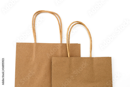 Two paper shopping bags isolated on white background. Eco-friendly packaging. Shopping. 
