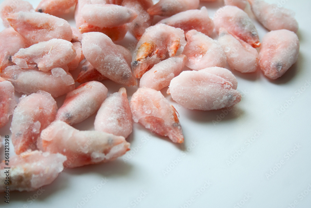 Frosted shrimps on white background close up Frosted shrimps on white background close up