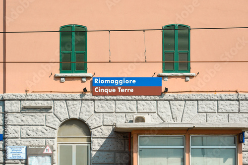 The railway train station and village sign for Riomaggiore Italy on the coast of the Cinque Terre photo