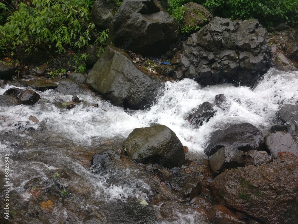 stream of water flowing stream of water flowing