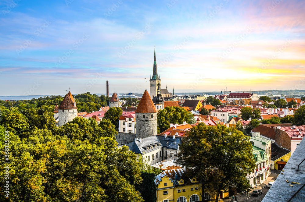 Late afternoon sunset view overlooking the medieval walled city of Tallinn Estonia on an early autumn day in the Baltics region of Northern Europe.
