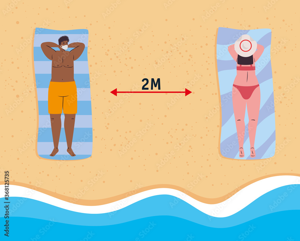 social distancing on the beach, couple wearing medical mask lying down