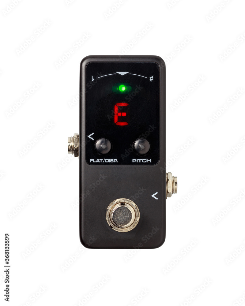 Stomp box electric guitar signal tuner effects foot pedal isolated on white background with clipping path. Stomp box electric guitar signal tuner effects foot pedal isolated on white background with clipping path.