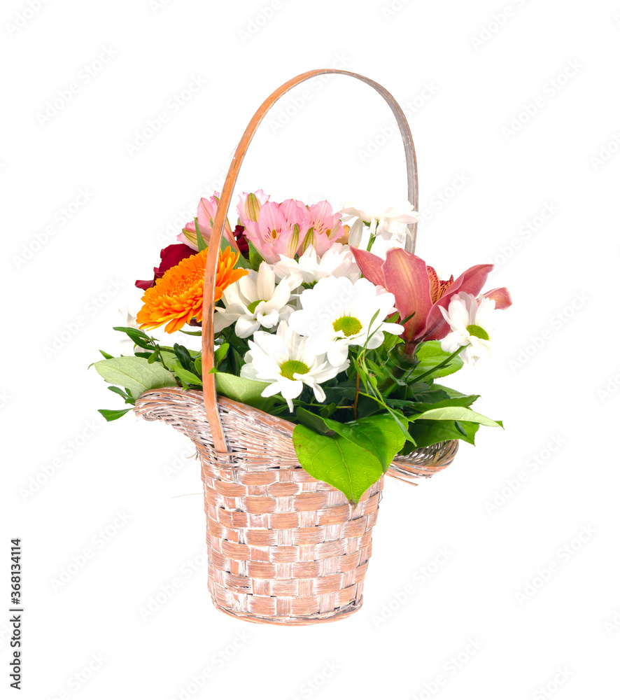 Wicker decorative basket with bouquet of beautiful flowers isolated on white background