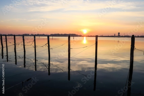 view of chiggia and sottomarina in venice at sunset photo