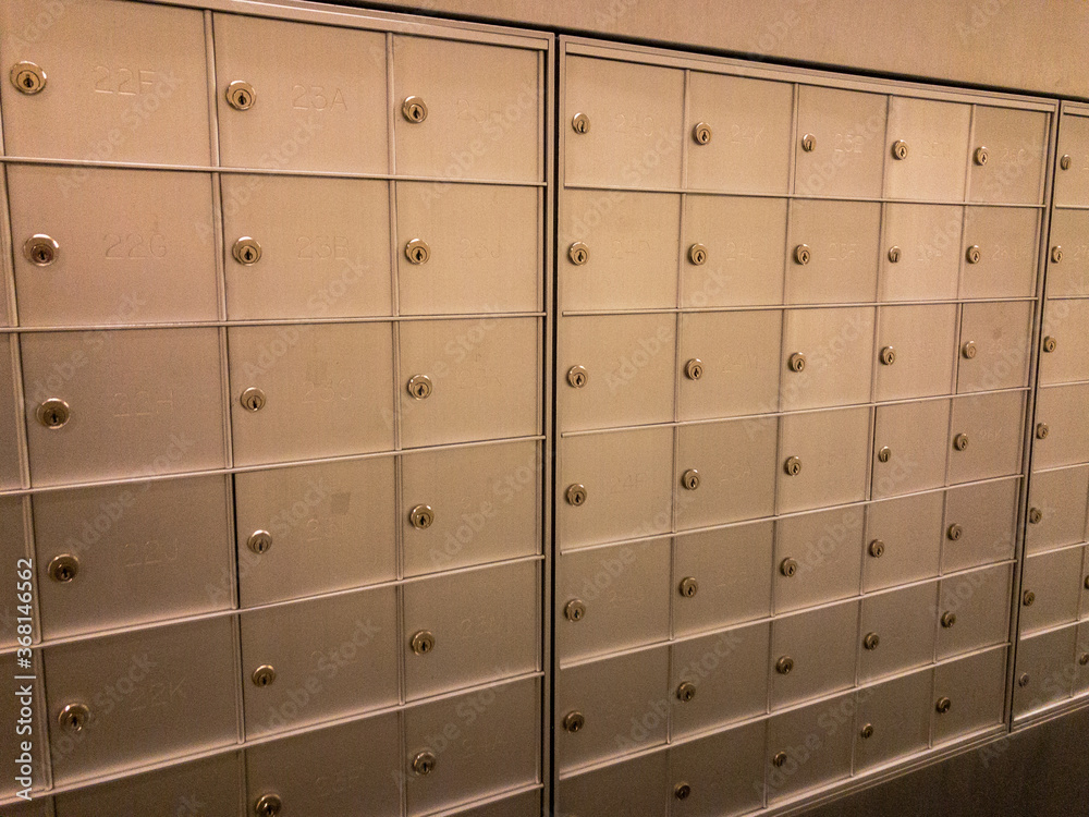 locked mail boxes in urban high rise building