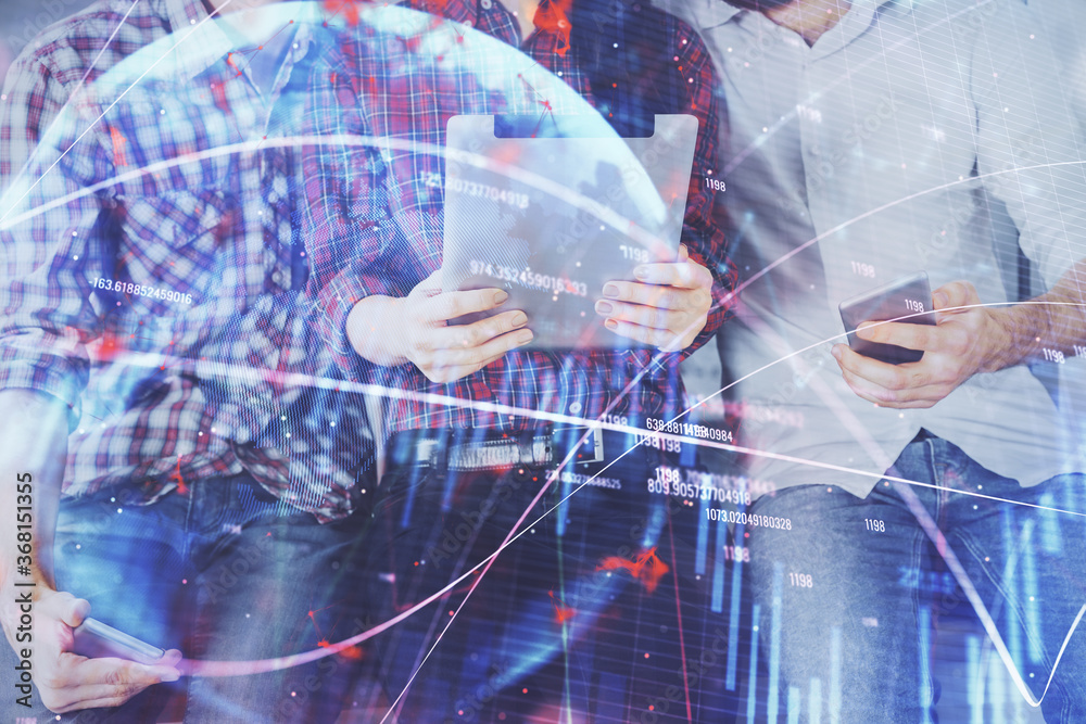Double exposure of forex graph drawing and man and woman working together holding and using a mobile device. Trade concept. Double exposure of forex graph drawing and man and woman working together holding and using a mobile device. Trade concept.