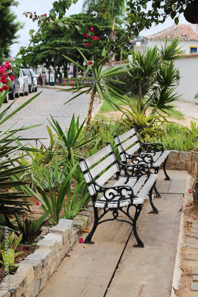 Obraz premium Two benches in the park