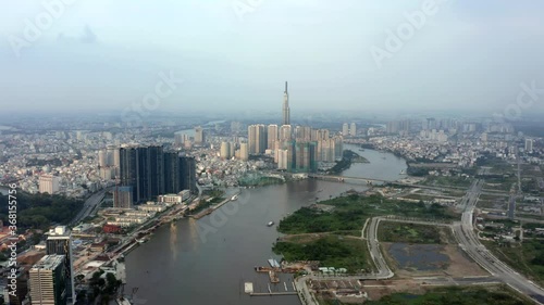 Drone flying towards Landmark 81 in Ho Chi Minh City / Saigon in Vietnam photo