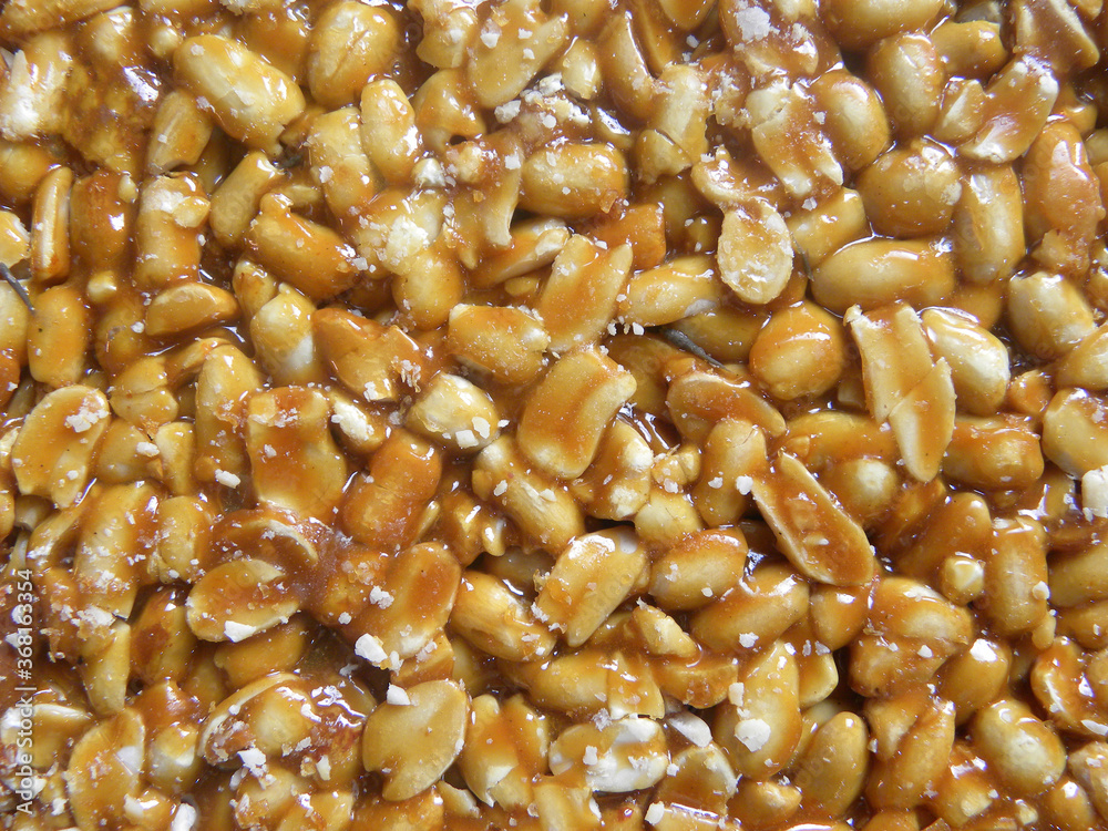 Brown color Peanut Chikki Indian snack texture Brown color Peanut Chikki Indian snack texture