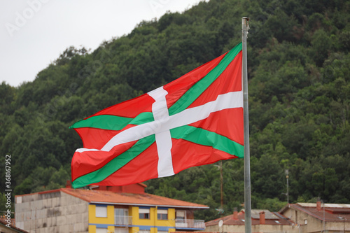 Basque flag flying in the village of Mundaka, Basque Country