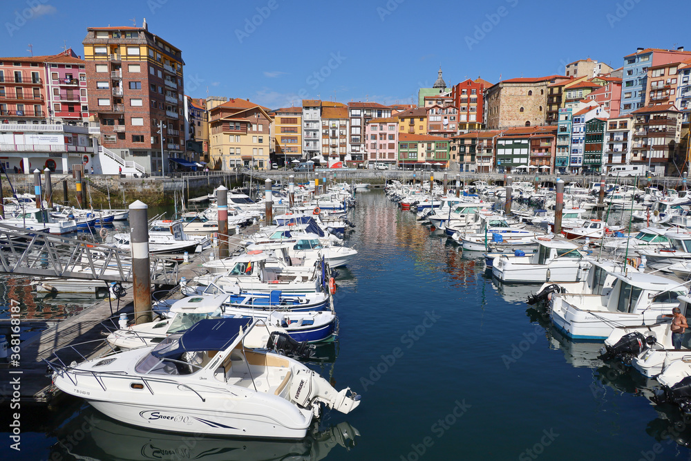 The beautiful sunlit port of Bermeo in the Basque Country, Spain