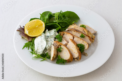 Greek Style Chicken with Salad and Tzatziki Sauce
