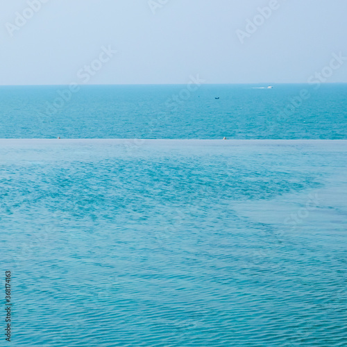 Swimming pool of luxury hotel. Empty swimming pool filled with water. Travel concept, travelling. Hotel business.
