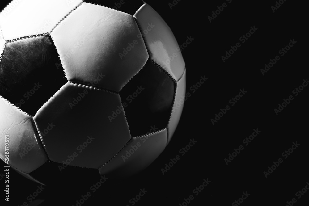 Obraz premium Soccer ball on dark background