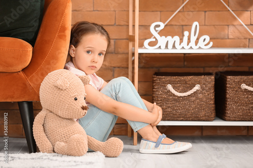 Sad little girl with autist...