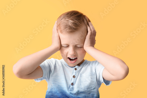 Screaming little boy with a...