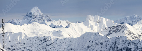 Amazing Winter Panorama with the snow covered Mountains Hochvogel, Hofats in Allgau Alps, Bavaria, Germany. photo